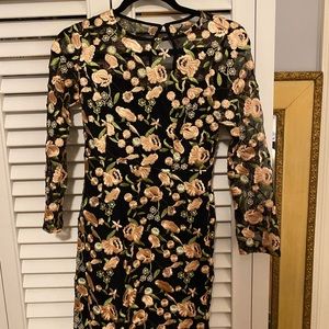 Black long sleeved dress with flower embroidery